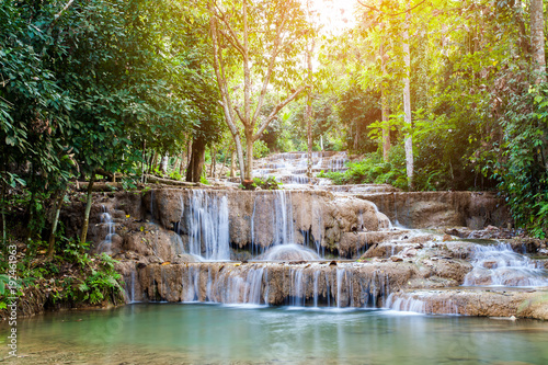 soft water of the stream in the natural park, Beautiful waterfall in rain forest ( Maekampong Waterfall, Thailand) photo