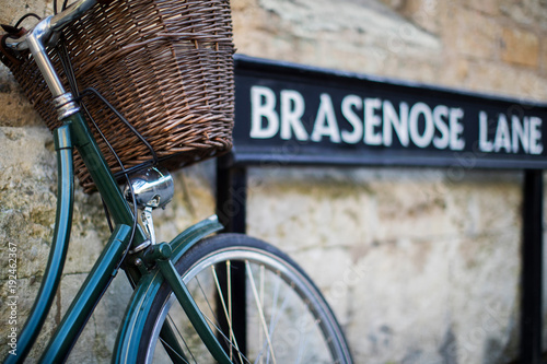 Bicycle Next To Brasenose Lane Sign Outside Oxford University College Buildings