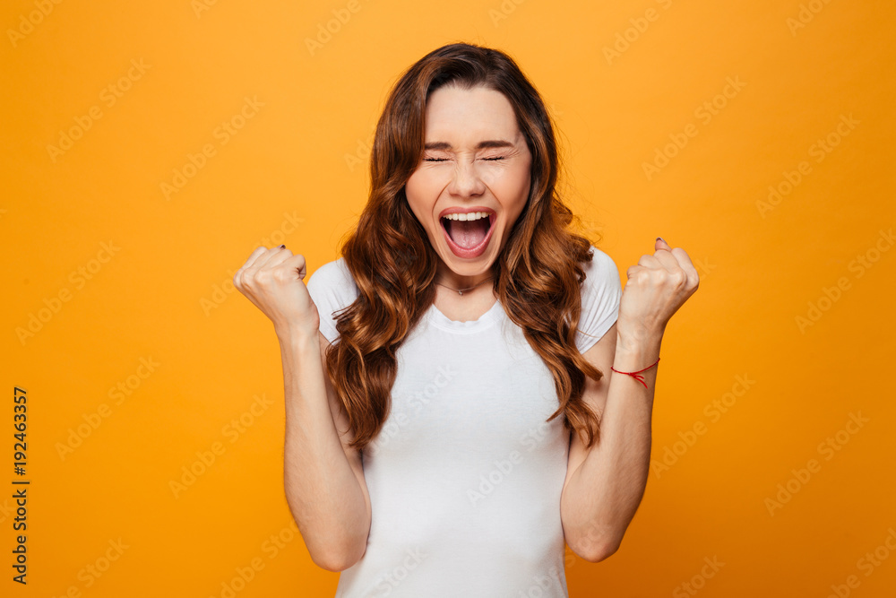 Screaming woman in t-shirt with closed eyes and open mouth Screaming woman in t-shirt with closed eyes and open mouth