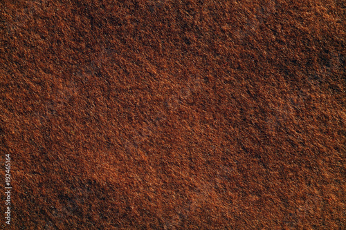 Felt surface in brown color.
