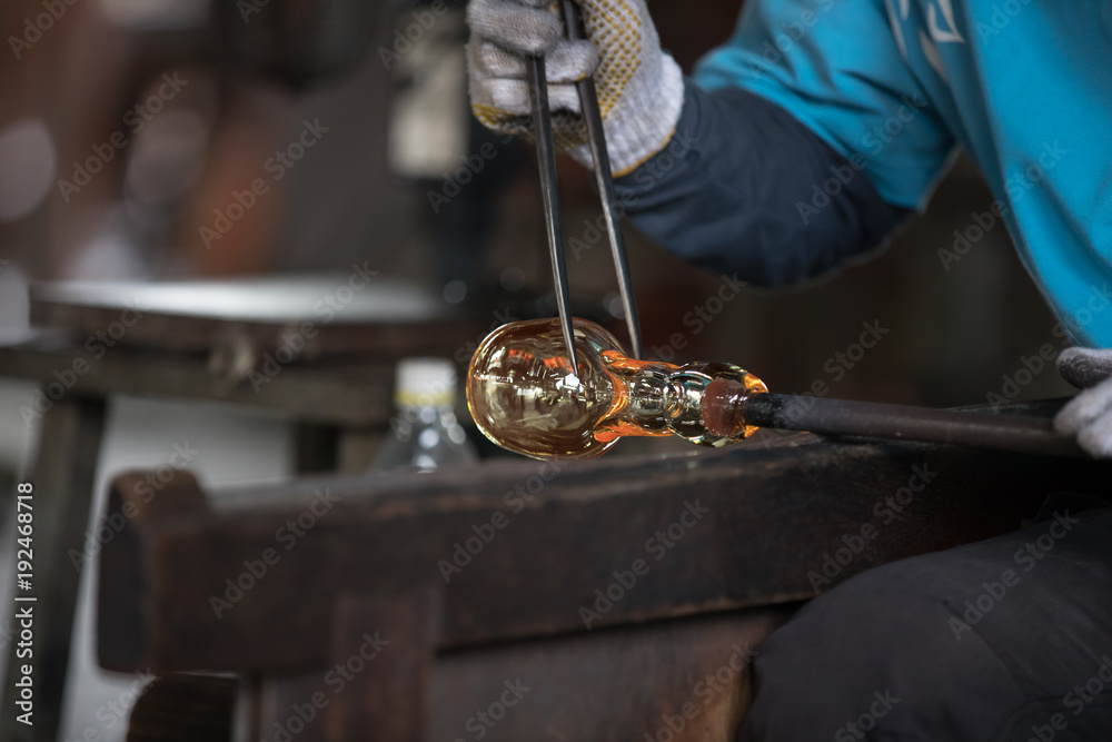 Molten glass on a metal rod