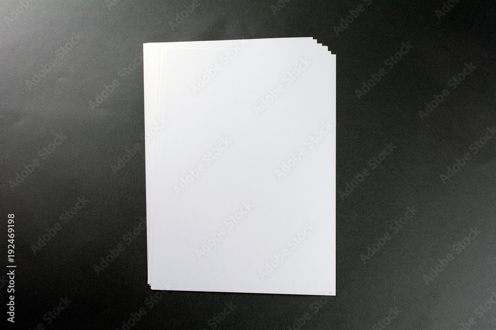 Blank sheets of paper gray background Blank sheets of paper gray background