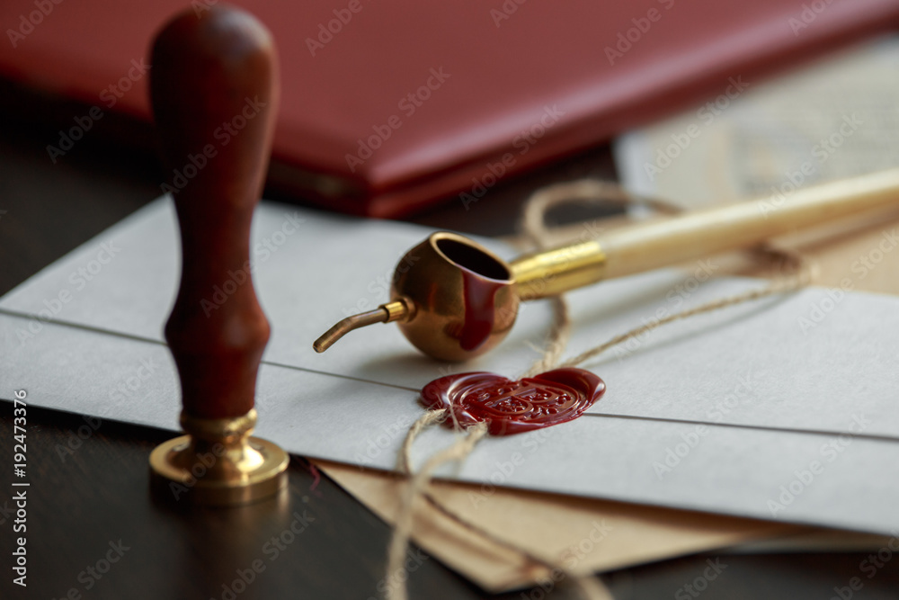 Notary's public pen and stamp on testament and last will. Notary public tools Notary's public pen and stamp on testament and last will. Notary public tools