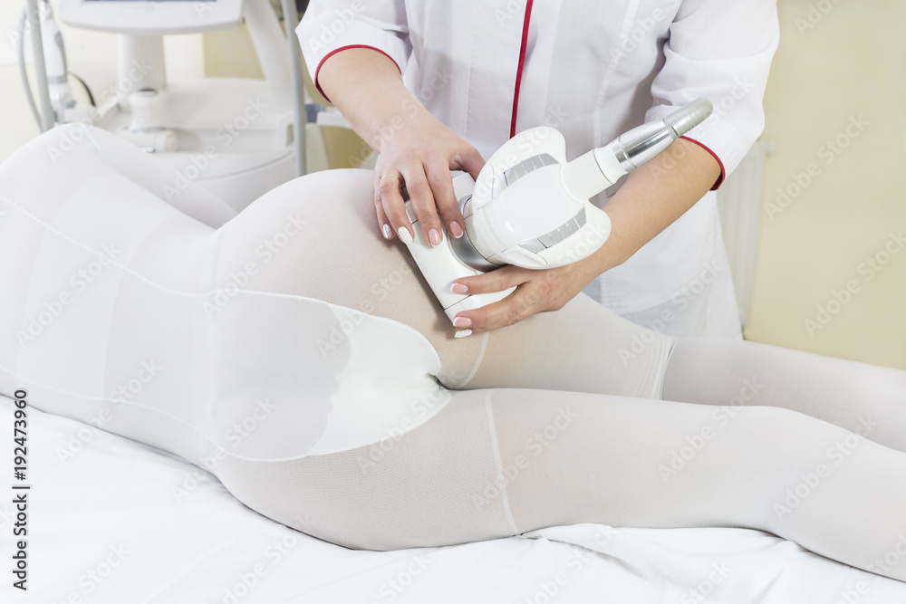 Woman is in the process at the clinic lipomassage Woman is in the process at the clinic lipomassage