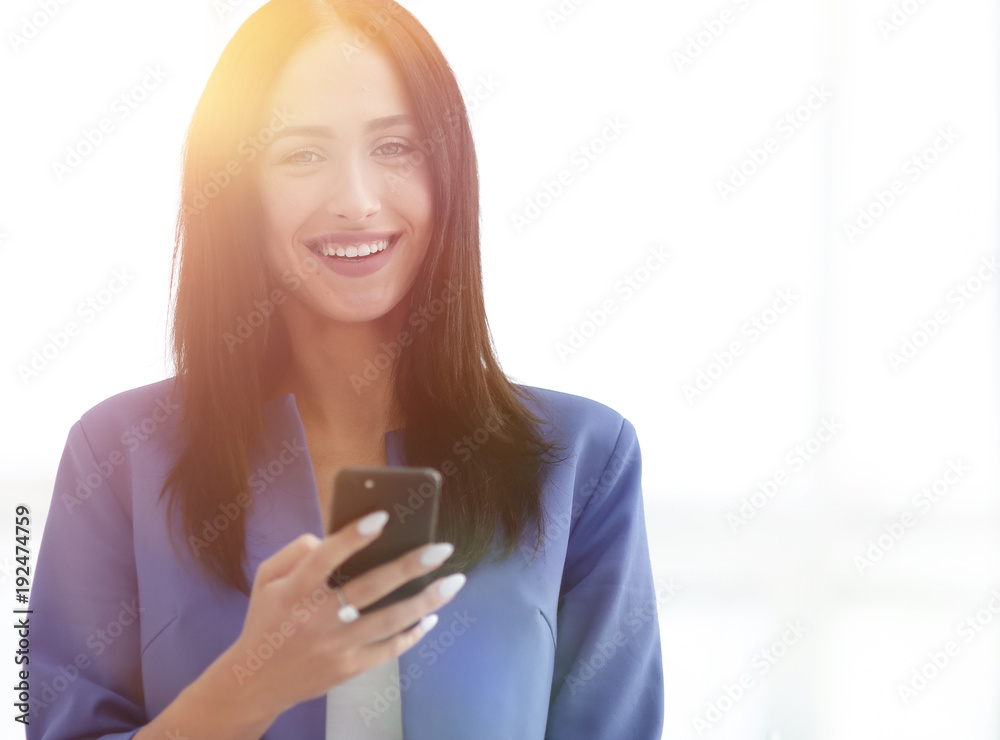 Young businesswoman with mobilephone Young businesswoman with mobilephone