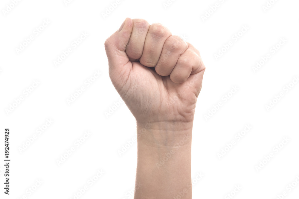 Left female hand fist - human hand gesture isolated on white background with copyspace Left female hand fist - human hand gesture isolated on white background with copyspace