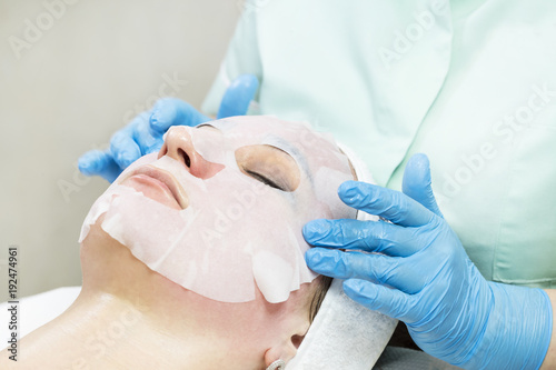 Massage and facial peels at the salon using cosmetics 