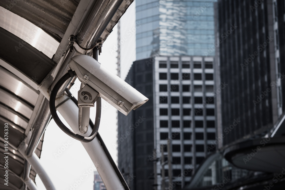 Naklejka premium Security cctv camera in city center.
