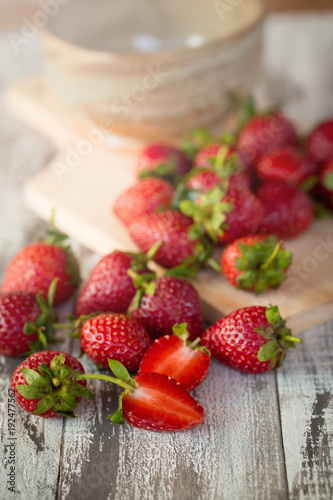 Strawberry In a bowl On a Wooden Background