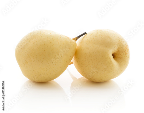 Nashi pears (Russet pear) isolated on white background two whole yellow. photo