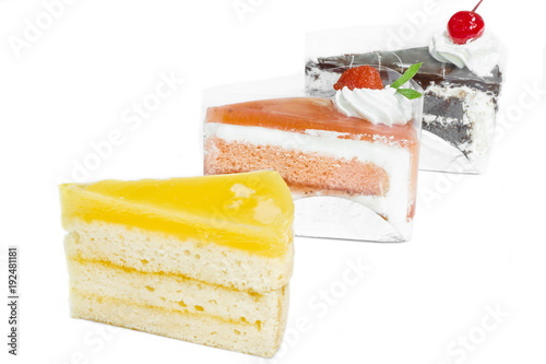 Orange cake, Chocolate cake, Strawberry cake on white background.