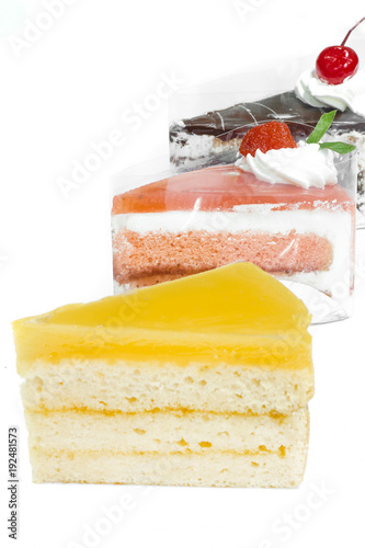 Orange cake, Chocolate cake, Strawberry cake on white background.