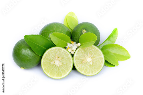 group of fresh lime slice and green leaf isolated on white background 