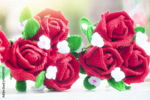 Red rose of yarn for celebration of Valentine day.