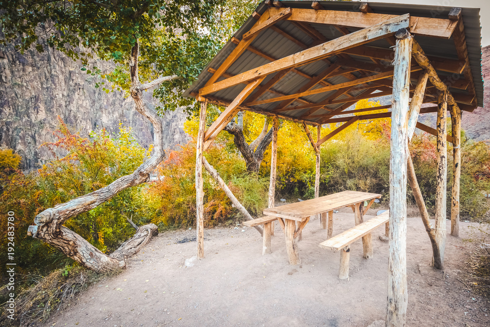 Tent with table for relax in canyon