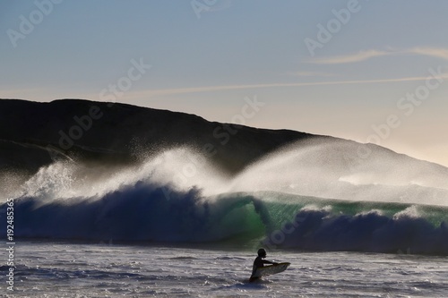 Surfer in windy waves