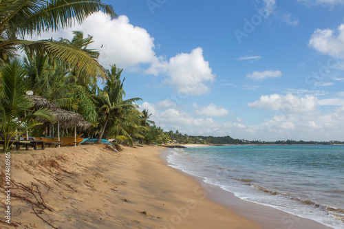 Sand and fishing boats on the beach.