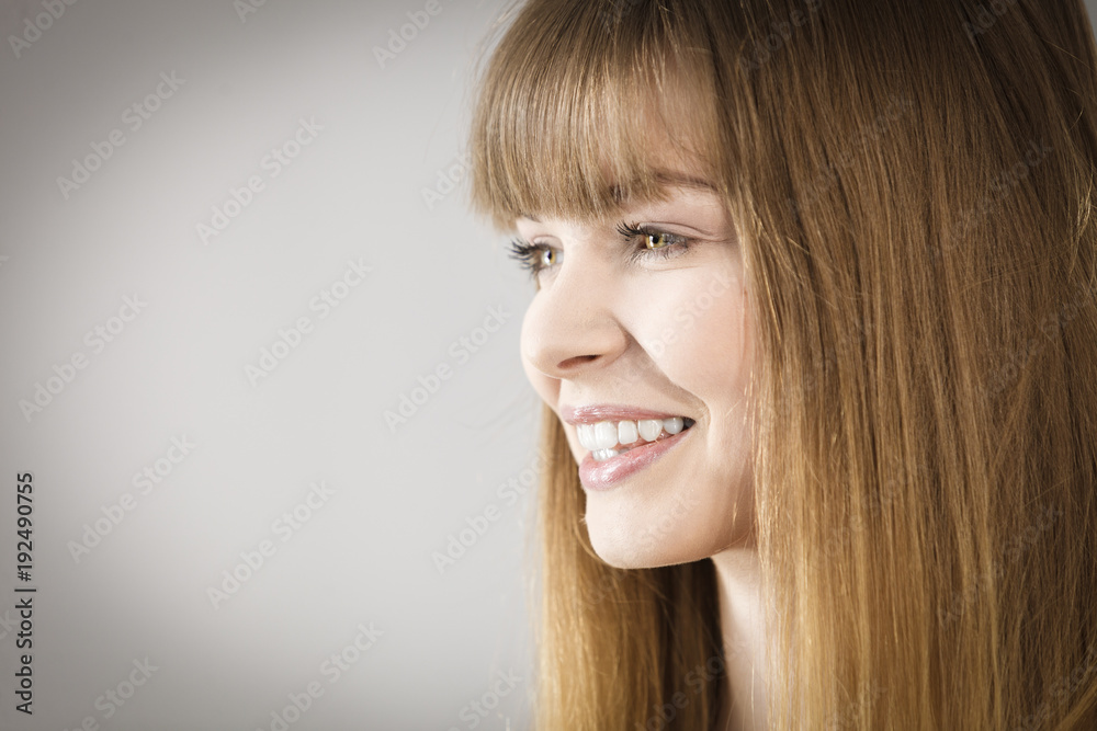 Portrait of happy blonde woman smiling with joy Portrait of happy blonde woman smiling with joy