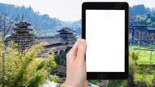 tourist photographs Fengyu bridge in Chengyang photo