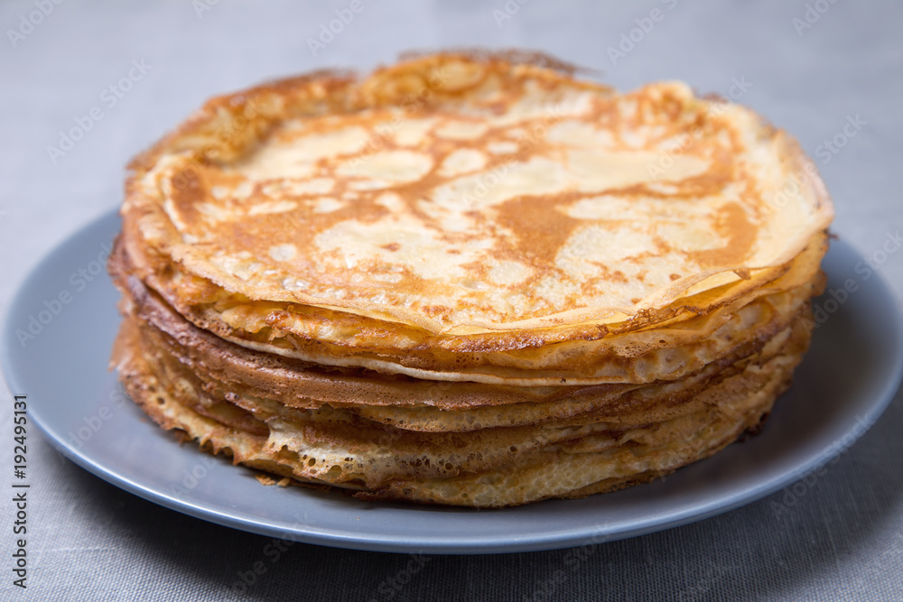 Traditional Russian pancakes. Shrovetide. Maslenitsa week. Selective focus, close-up.