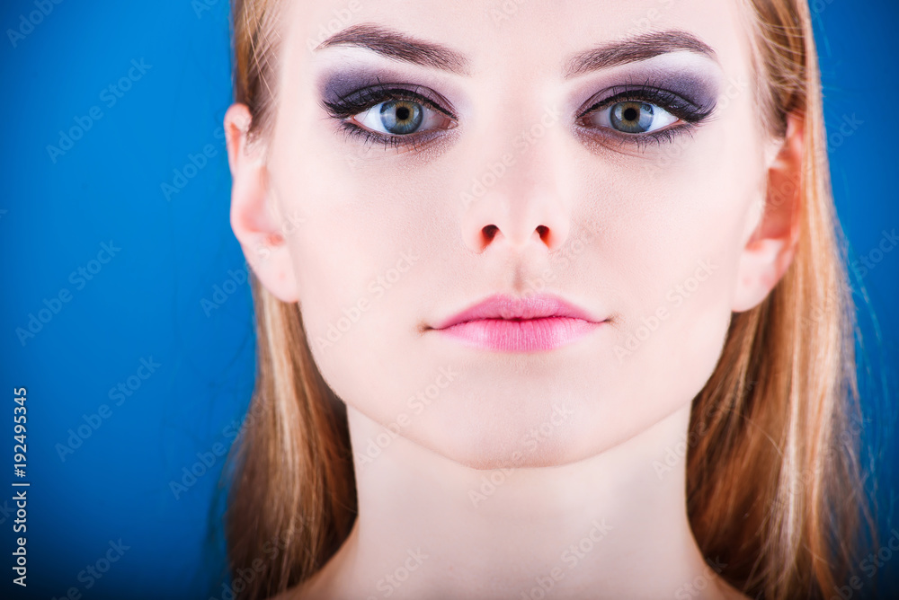Fototapeta premium Close-up of a young girl face with creative visage face art