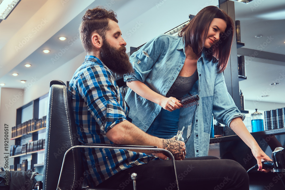 Obraz premium Handsome bearded man in the barbershop.