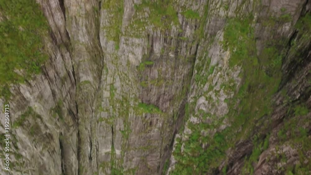 Aerial view from drone on breathtaking lysefjord during the rain. Cloudy sky. 4k footage, drone view. Preikestolen, Norway. Aerial view from drone on breathtaking lysefjord during the rain. Cloudy sky. 4k footage, drone view. Preikestolen, Norway.