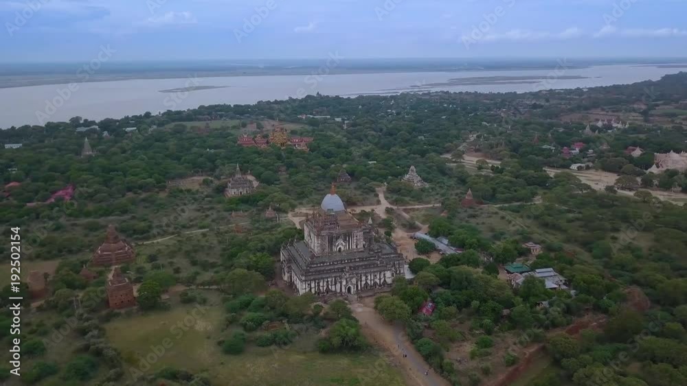 Aerial view of Thatbyinnyu Temple in Bagan, Myanmar. Bagan is Asias most important archeological sites with an ancient city Aerial view of Thatbyinnyu Temple in Bagan, Myanmar. Bagan is Asias most important archeological sites with an ancient city