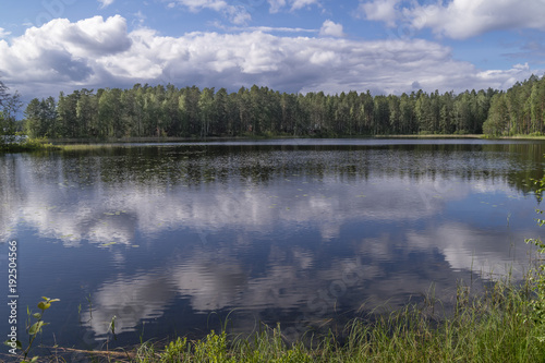 Fototapeta Naklejka Na Ścianę i Meble -  Clouds that are reflected in the lake, Punkaharju, Lake District, Finland