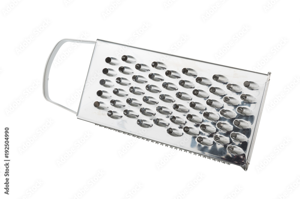 Grater for vegetables. Kitchen accessories. Tools for cooking. A spoon. Isolated on white background. For your design. An object. Grater for vegetables. Kitchen accessories. Tools for cooking. A spoon. Isolated on white background. For your design. An object.