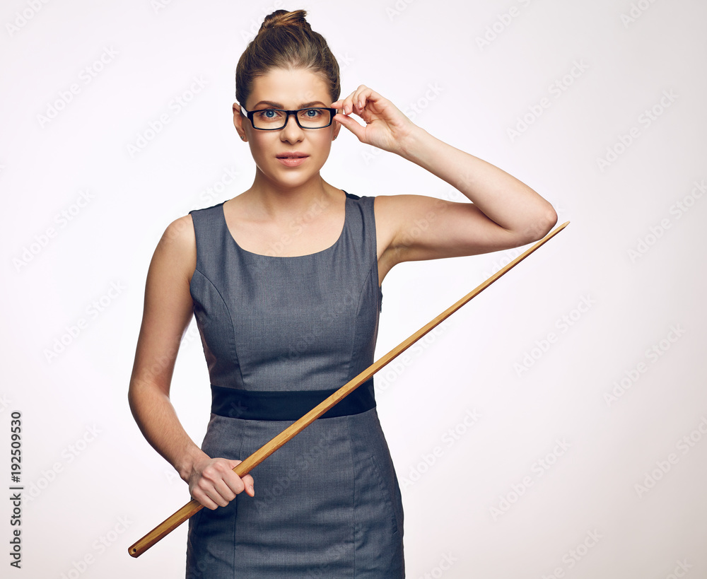 School teacher wearing glasses holding pointer. School teacher wearing glasses holding pointer.