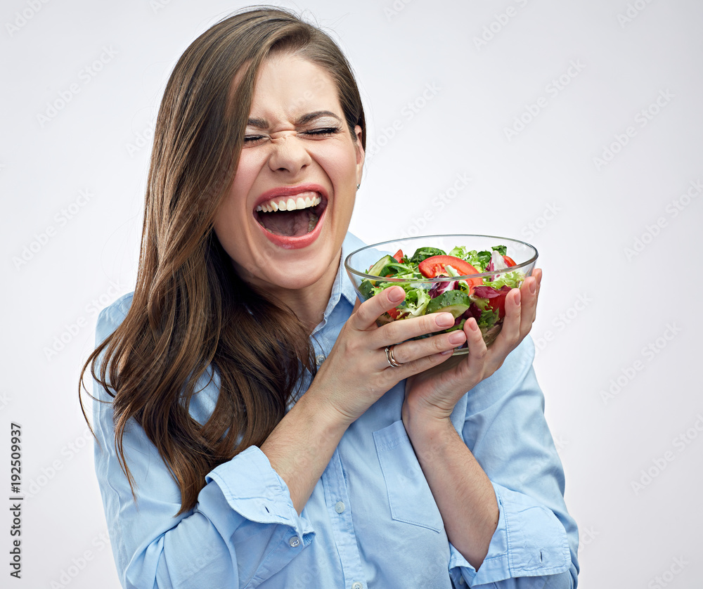 Happy woman holding salad bowl. Healthy food. Happy woman holding salad bowl. Healthy food.