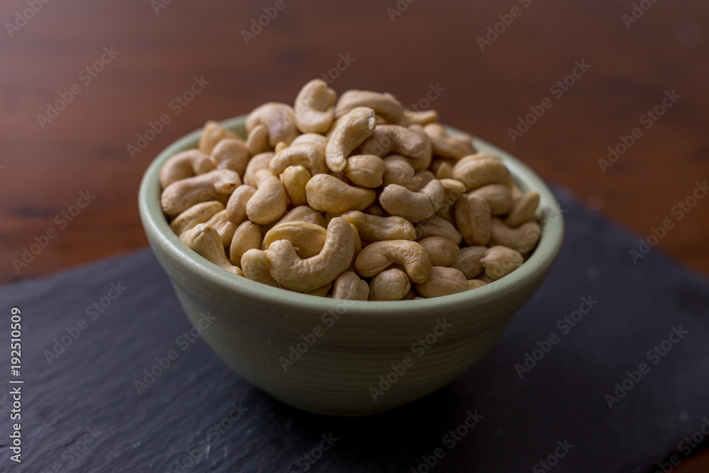 Natural cashews in bowl Natural cashews in bowl