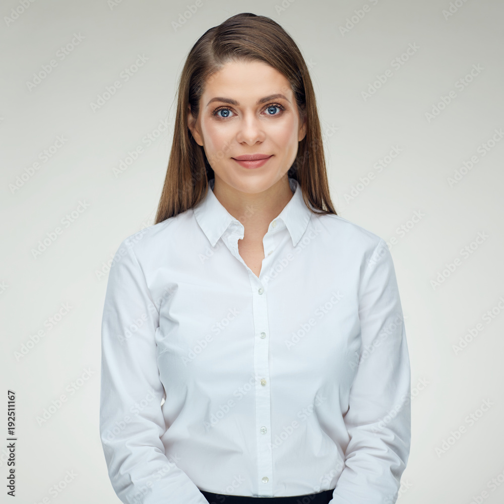 Business woman with light smile wearing white shirt. Business woman with light smile wearing white shirt.