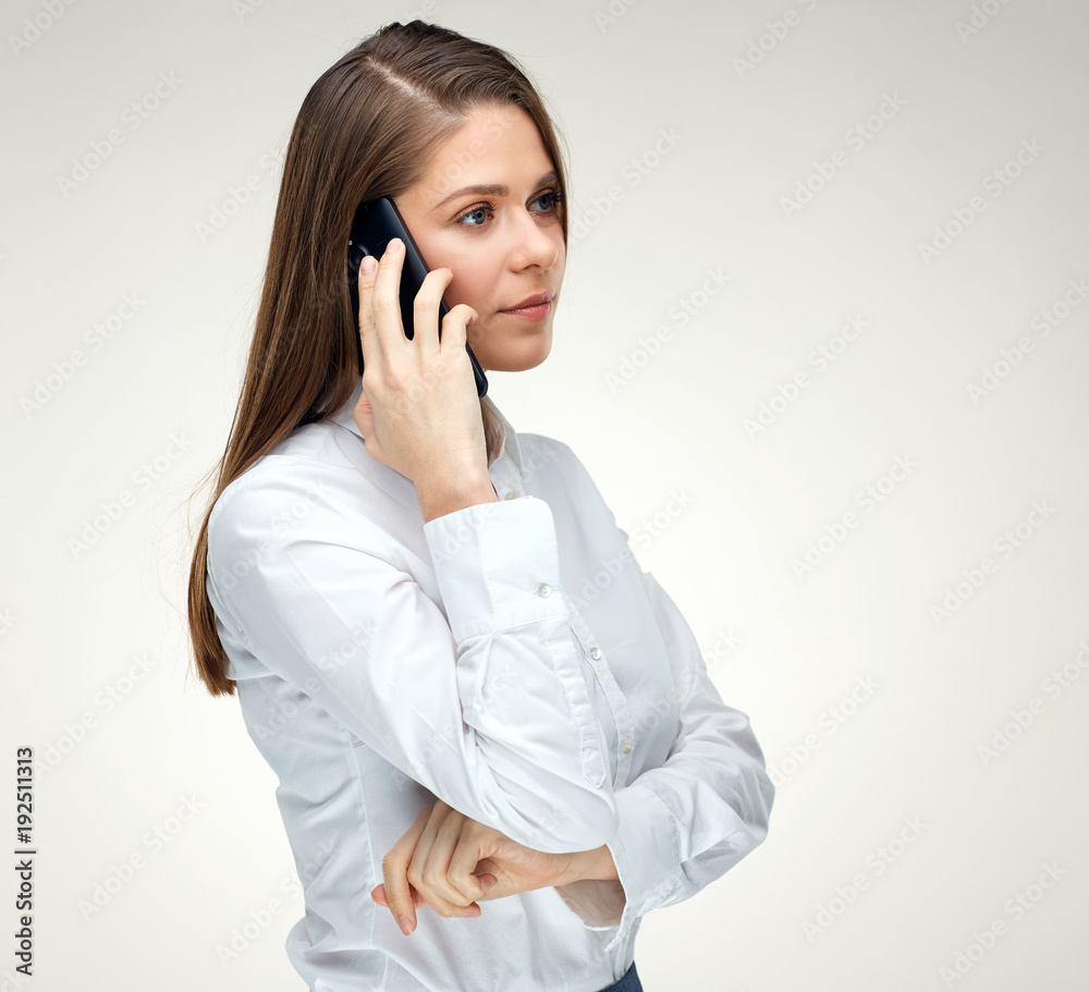Woman talking with mobile phone. Isolated portrait Woman talking with mobile phone. Isolated portrait