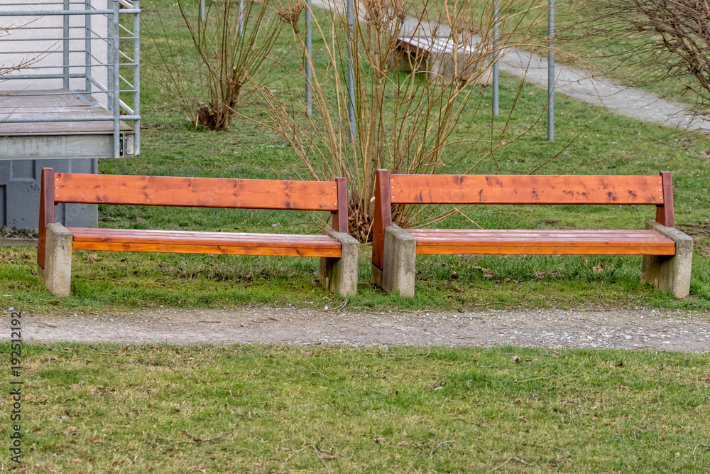 Two benches next to each other where you can sit Two benches next to each other where you can sit