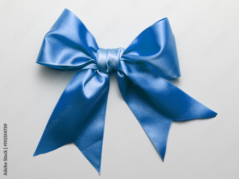 Premium Photo  Dark blue ribbon bow isolated on white