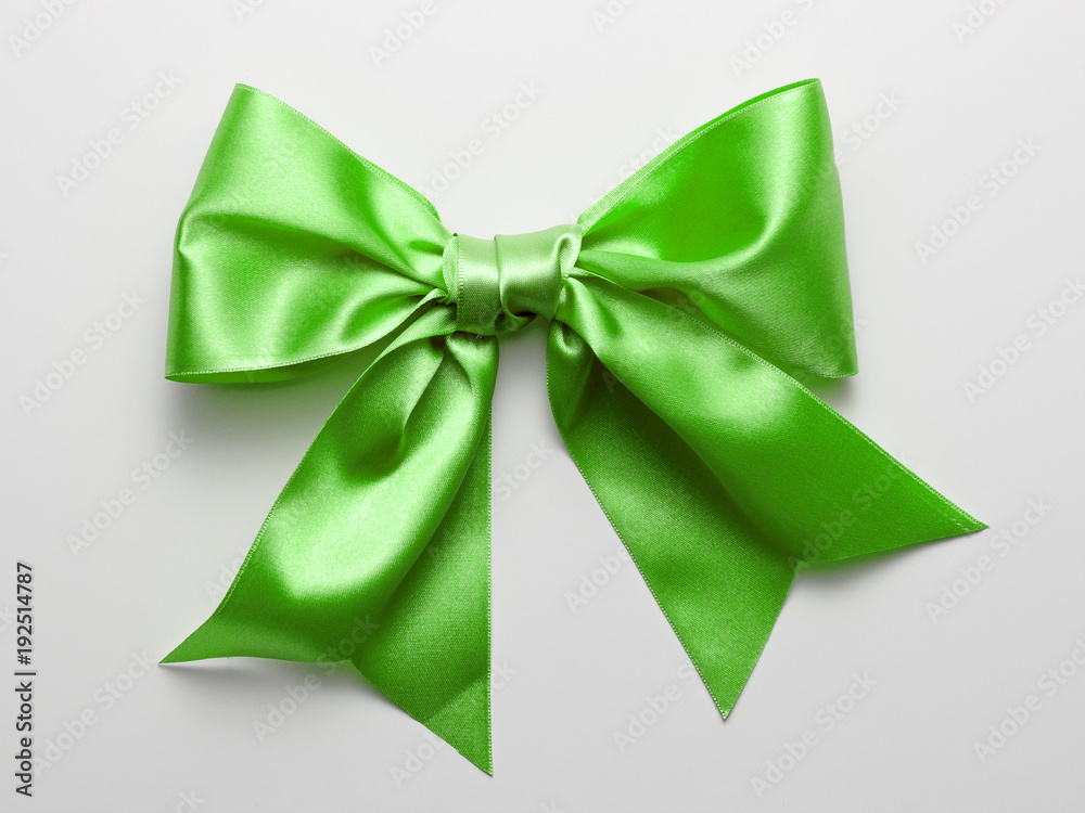 Green Ribbon Bow with Real Shadow isolated on White Background Green Ribbon Bow with Real Shadow isolated on White Background