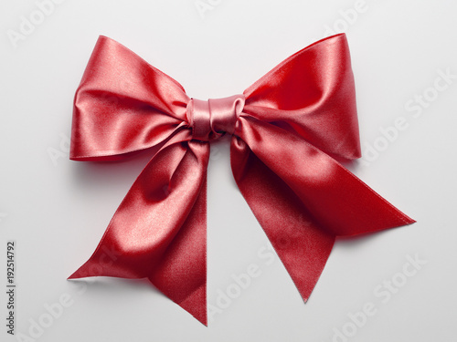 Red Ribbon Bow with Real Shadow isolated on White Background
