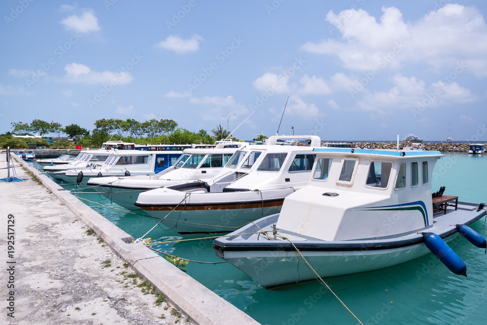 Speedboats at island wharf