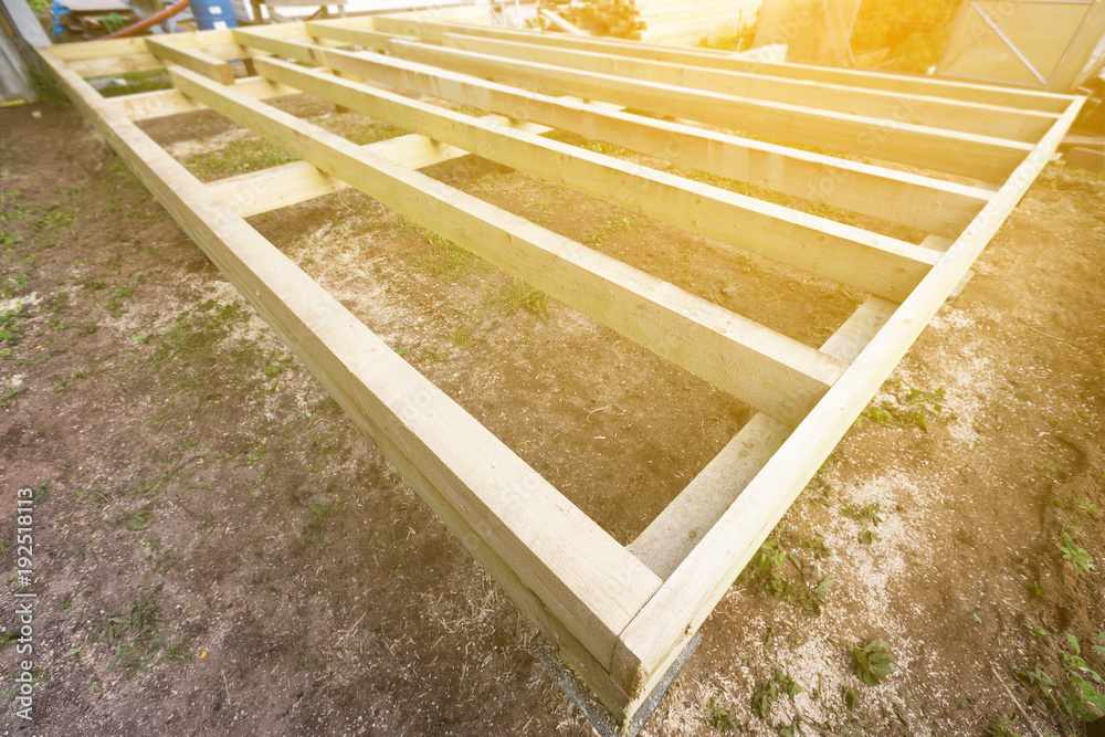 Wooden frame house foundation on screw piles Stock Photo | Adobe Stock