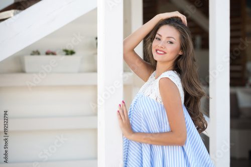 Young smiling woman outdoors portrait. Close portrait.