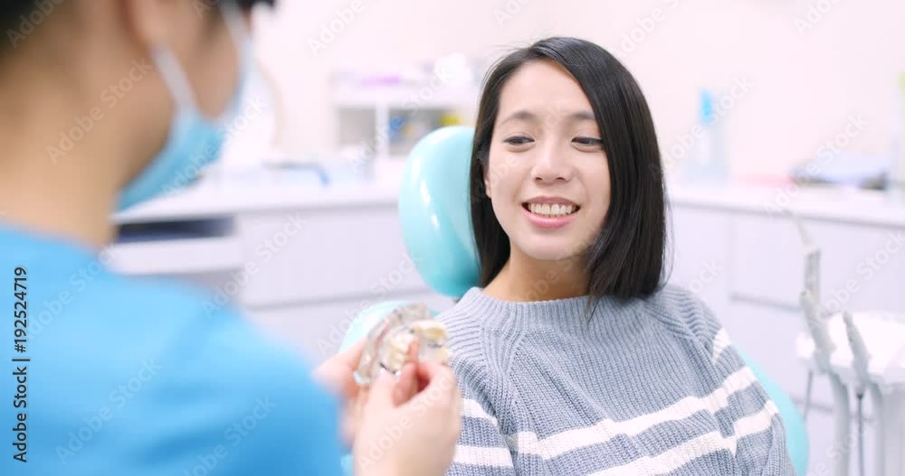 Doctor explain the process of teeth implant