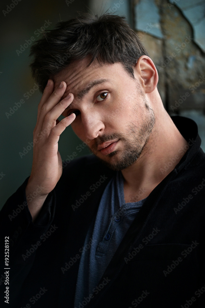Mysterious handsome man with sneaky look. man with beard smiling. sexy guy in a dark jacket with confident face. Sexy and smart man with beautiful eyes. businessman on a dark romantic background. Mysterious handsome man with sneaky look. man with beard smiling. sexy guy in a dark jacket with confident face. Sexy and smart man with beautiful eyes. businessman on a dark romantic background.