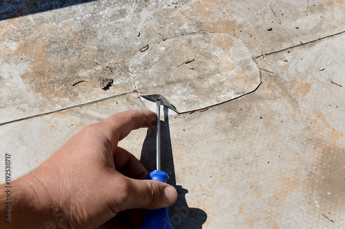 poorly welded piece of material on the PVC membrane, patch, old roof