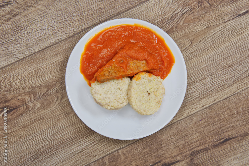 Tomto sauce with dumpling on a table Tomto sauce with dumpling on a table