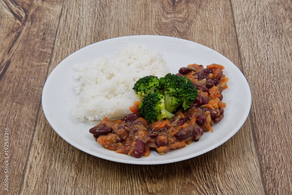 Azuki with vegetable and rice on table Azuki with vegetable and rice on table