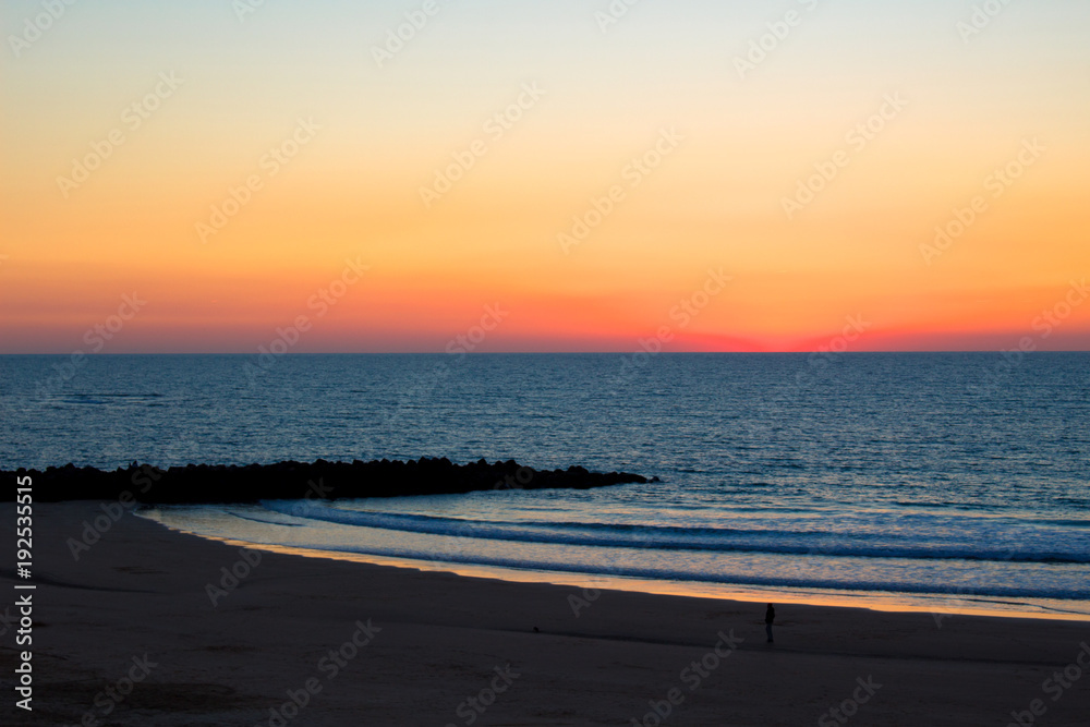 Fototapeta premium Sunset. Cádiz beach in the evening. Cádiz. Picture taken – February 10, 2018.