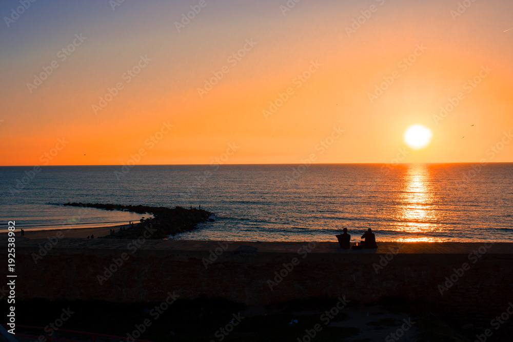 Sunset. Cádiz beach in the evening. Cádiz, Spain.