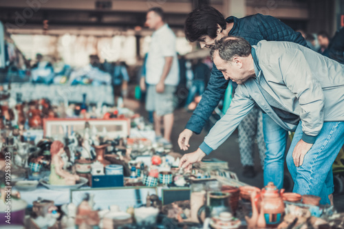 фотографія Couple shopping at flea market